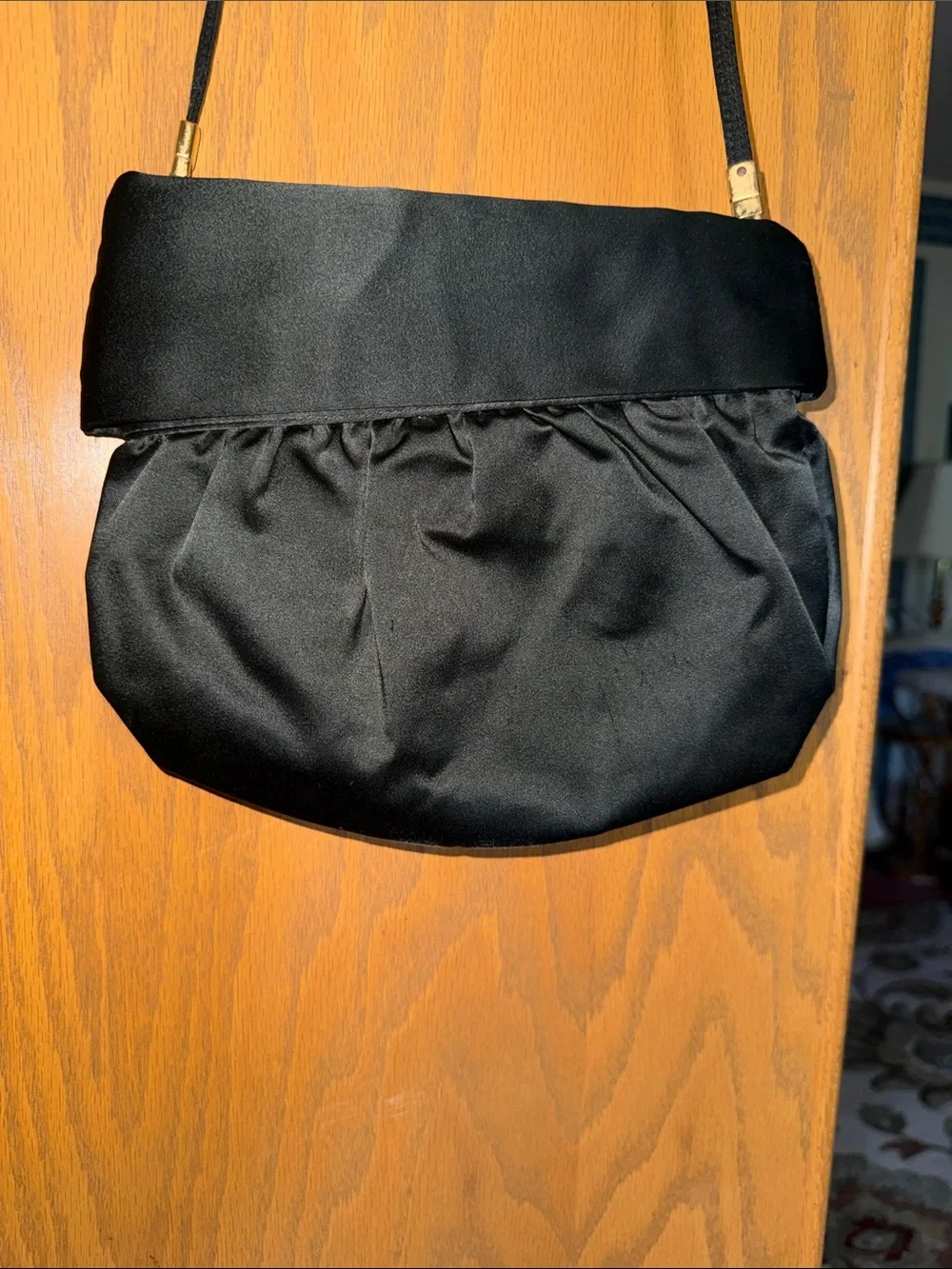 Black Satin Shoulder Clutch with Tassel Accent